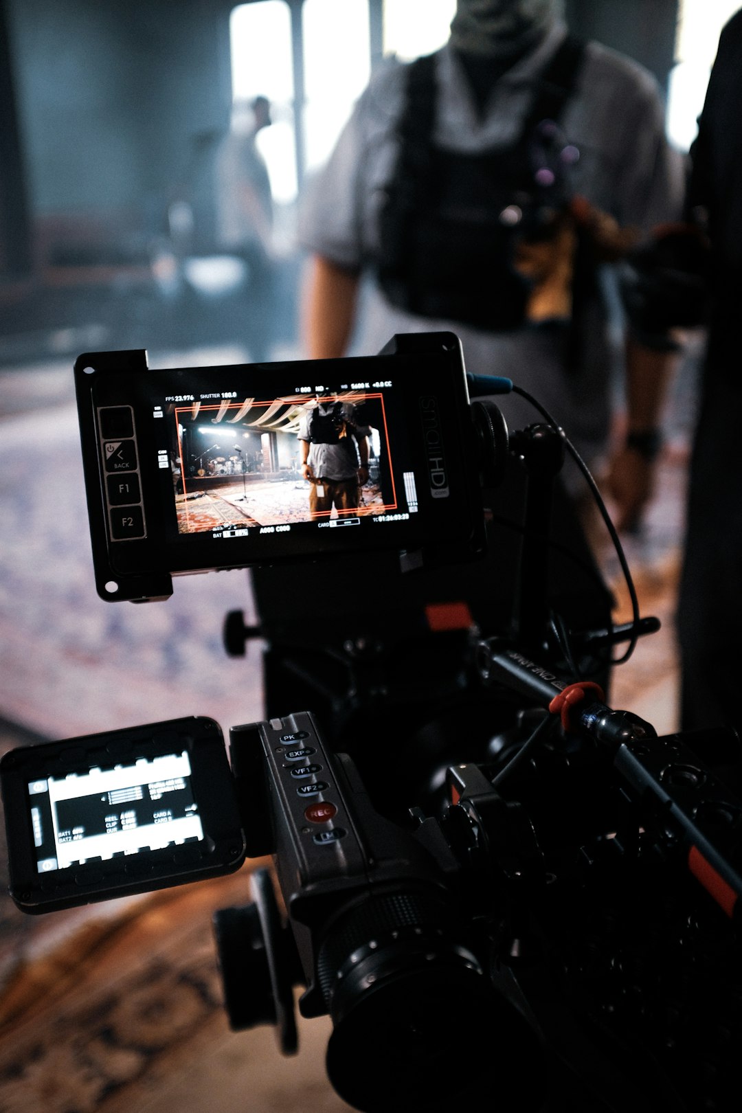 black-dslr-camera-taking-photo-of-people-standing-on-stage-mvtkfomca8m